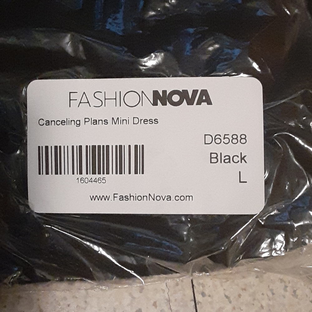 Black off shoulder mini dress